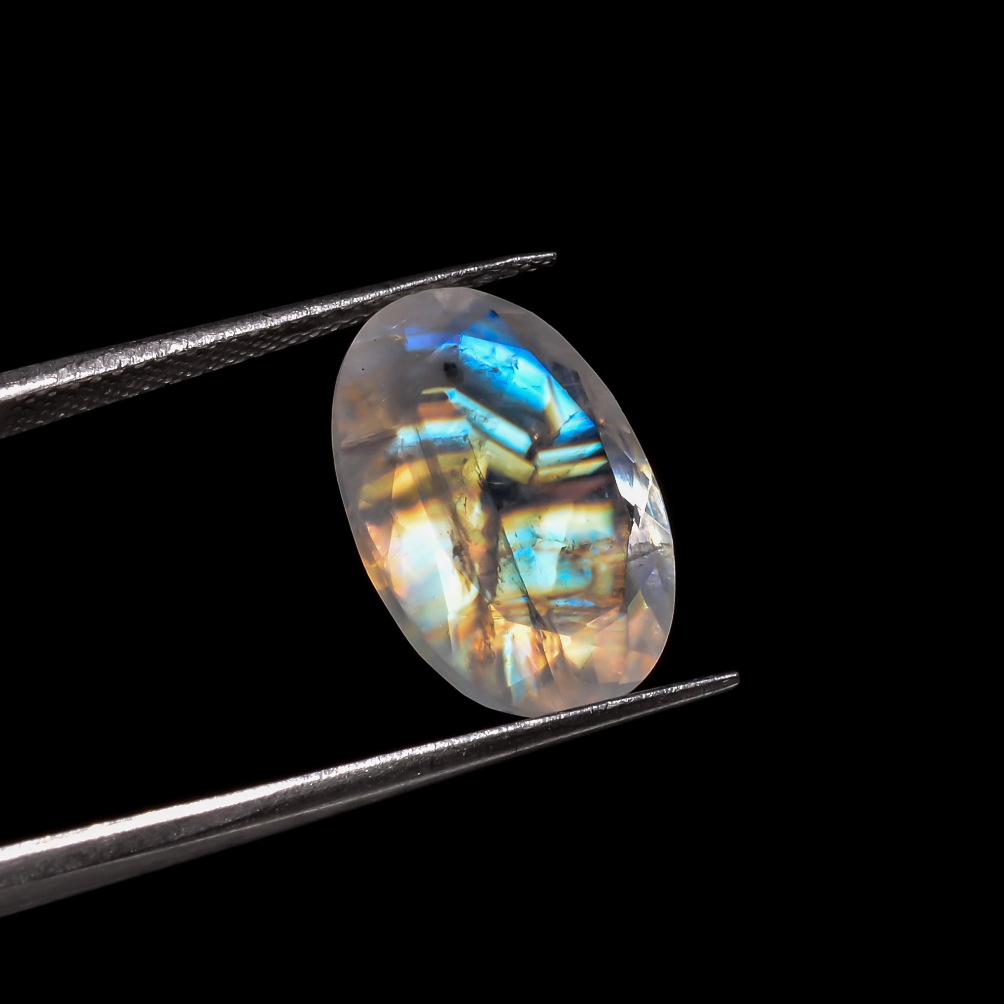 golden illusion blue moonstone oval shape cut stone loose gemstone